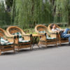 Picture of four wicker chairs in a street