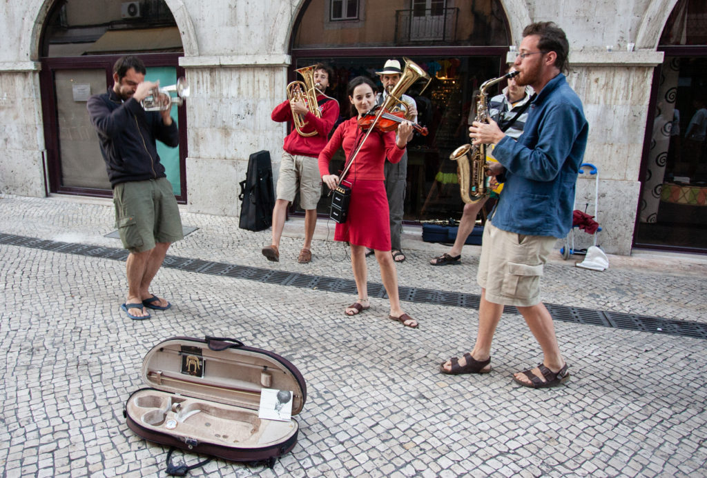 Several musicians playing in the street