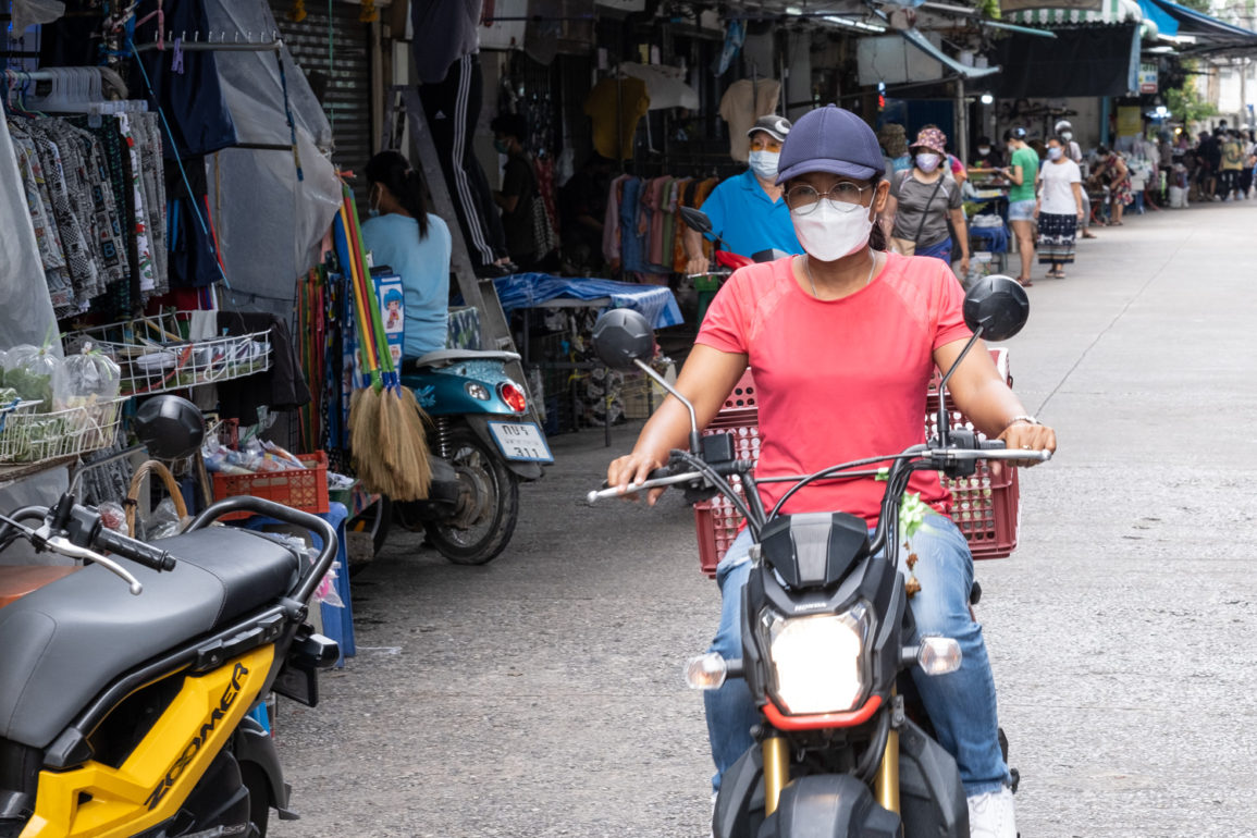 Woman riding a scooter