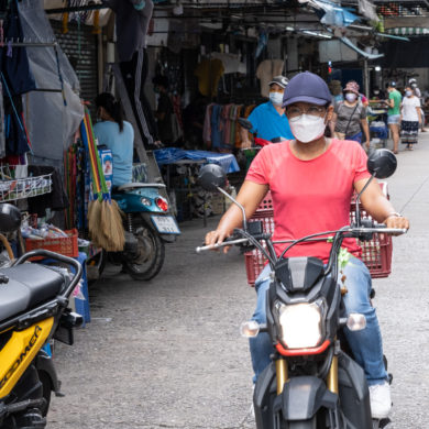 Woman riding a scooter