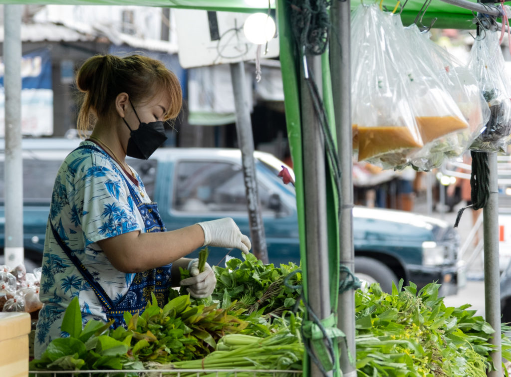 Woman selling vegetables