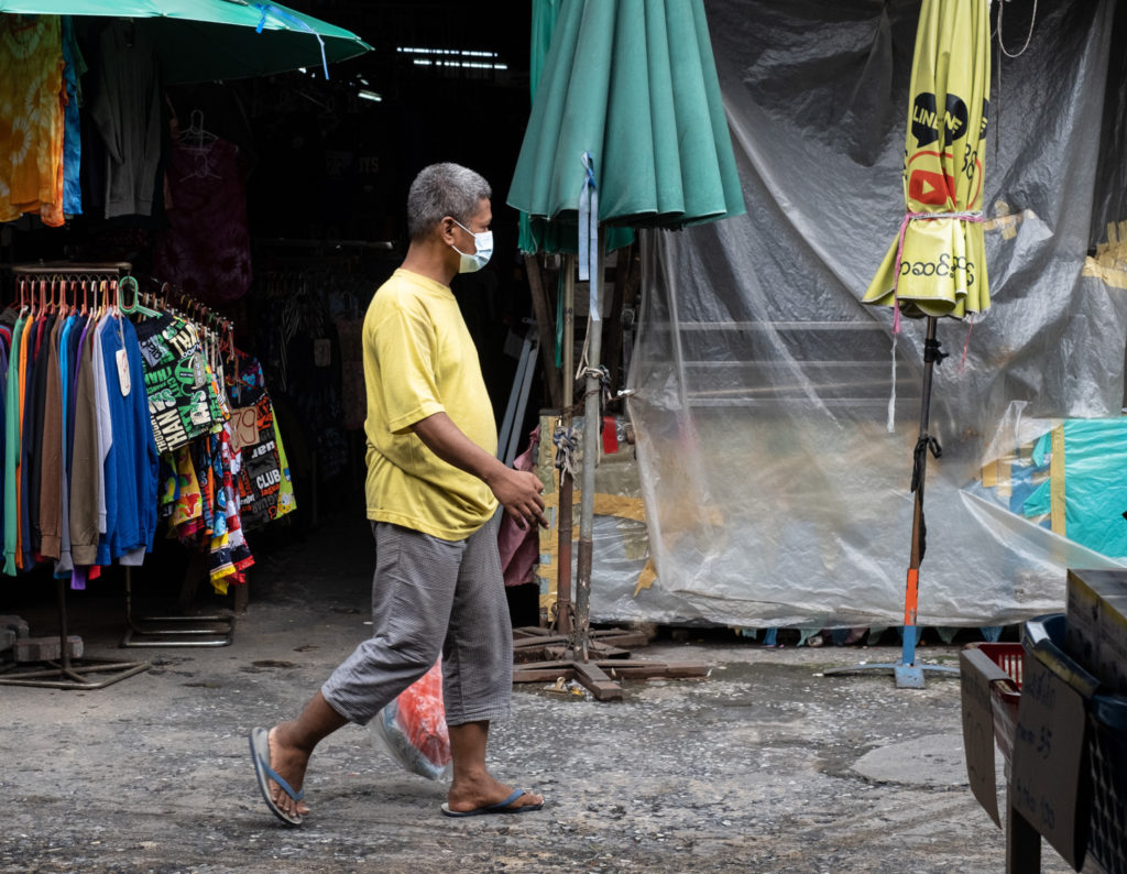 Man walking in alley