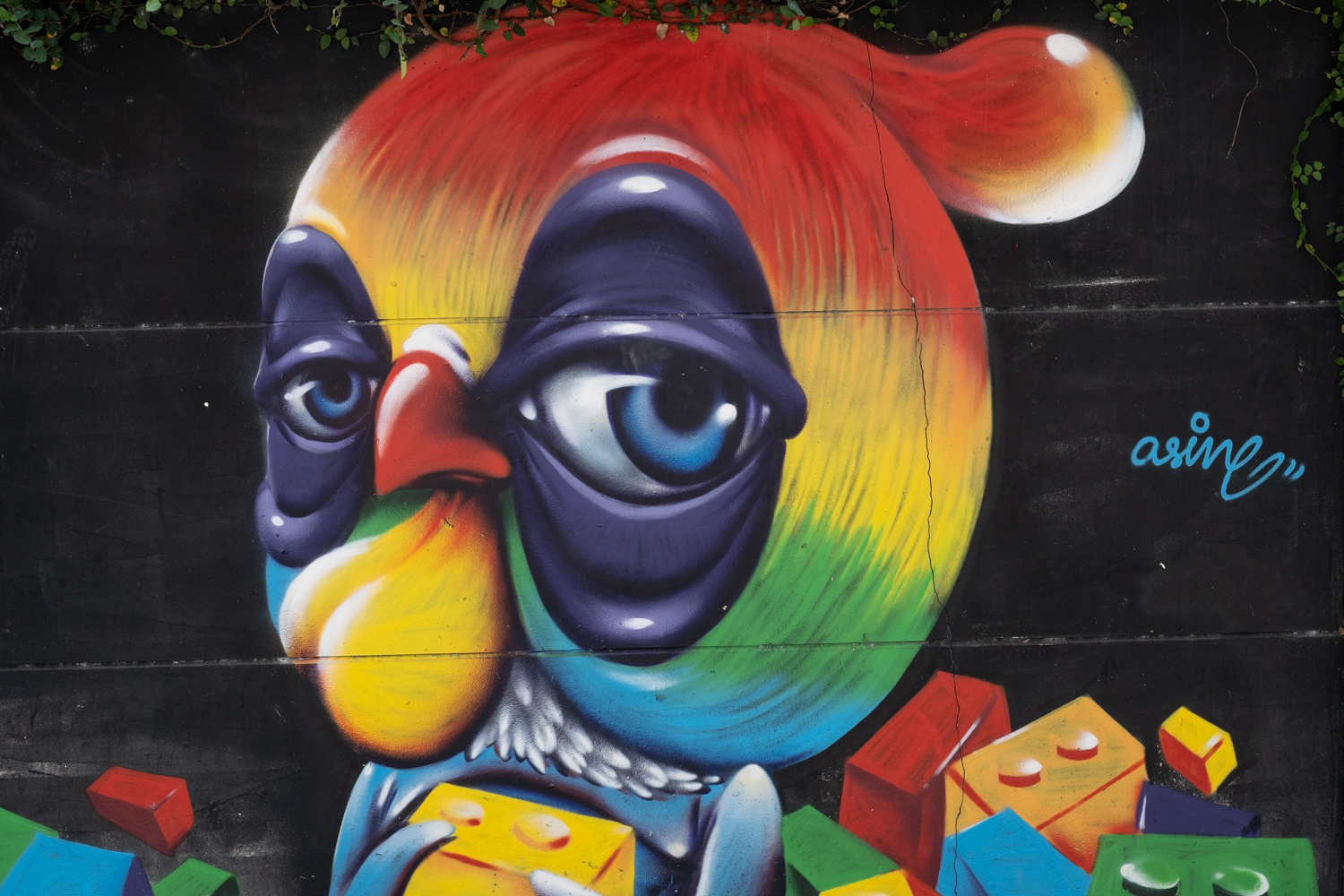 graffiti an owl and legos in rainbow colors