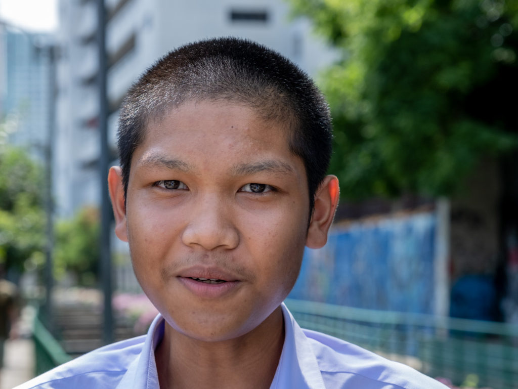 middle school student with close-cropped hair